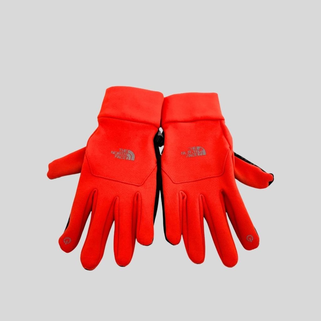 The North Face orange autumn gloves for autumn/winter trip