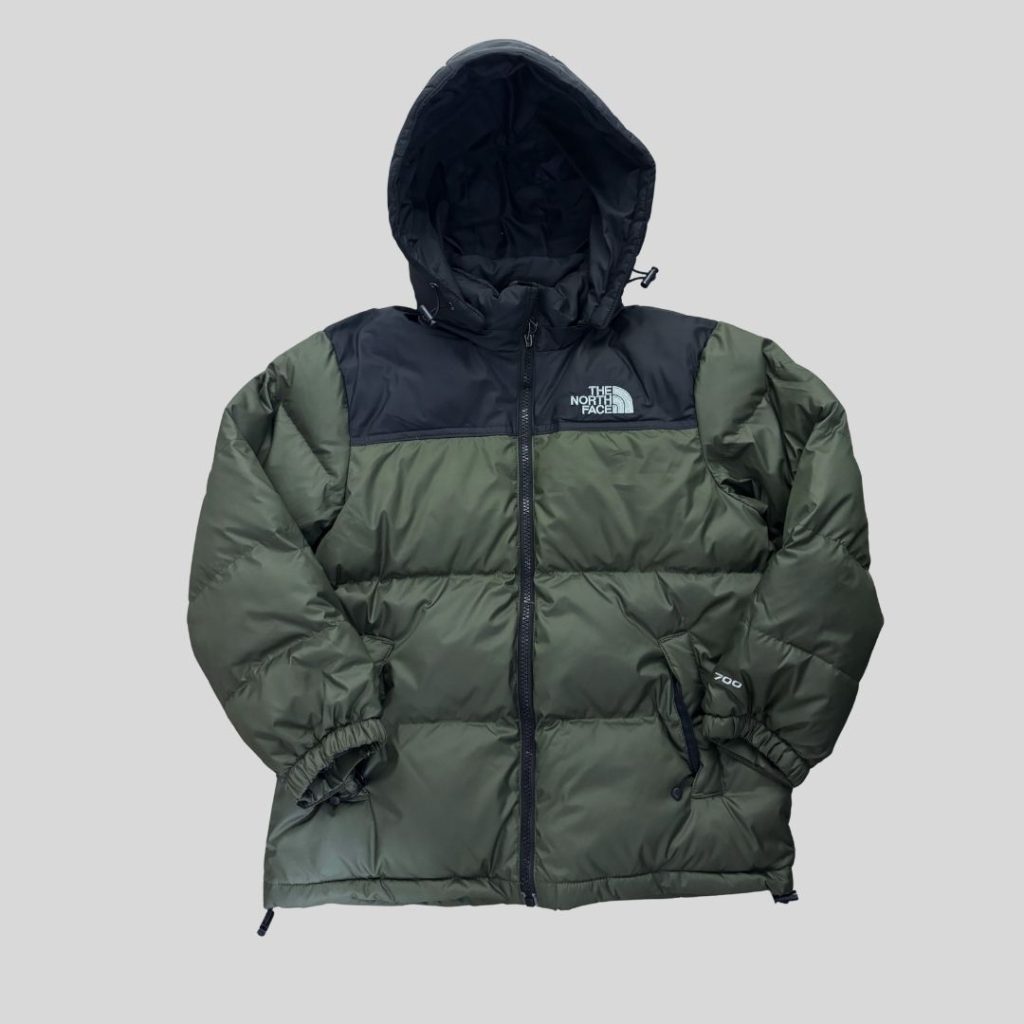 The North Face Kid green jacket suitable for winter trip