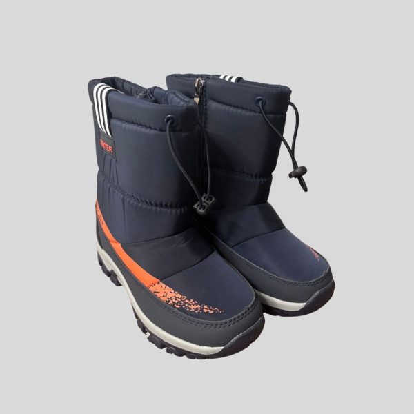 thick orange wool fleece kids boots with built in ice cleats for winter trip